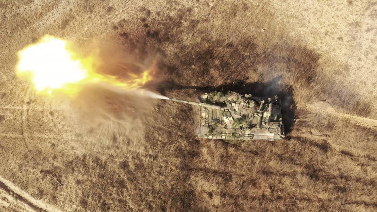 A Ukrainian Armed Forces tank fires during military drills at a training ground near the border with Russian-annexed Crimea, in the Kherson region of Ukraine, on  November 17, 2021.
