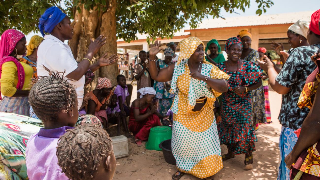 Kangenlen Kato, a song and dance group, creates awareness of trachoma through music in Mariama Kunda, Gambia.