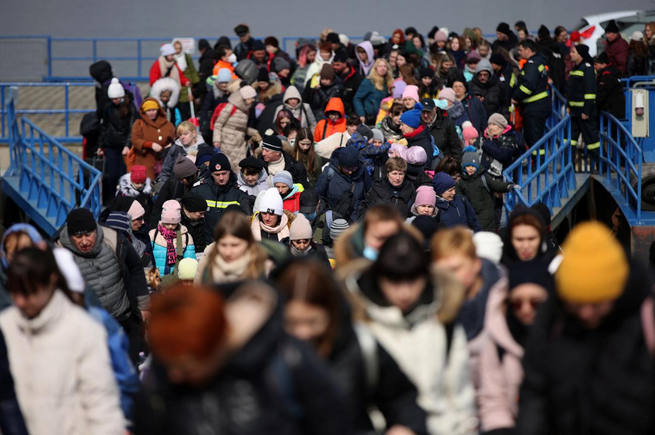 People arrive by ferry after fleeing from Russia's invasion of Ukraine, at the Isaccea-Orlivka border crossing, Romania