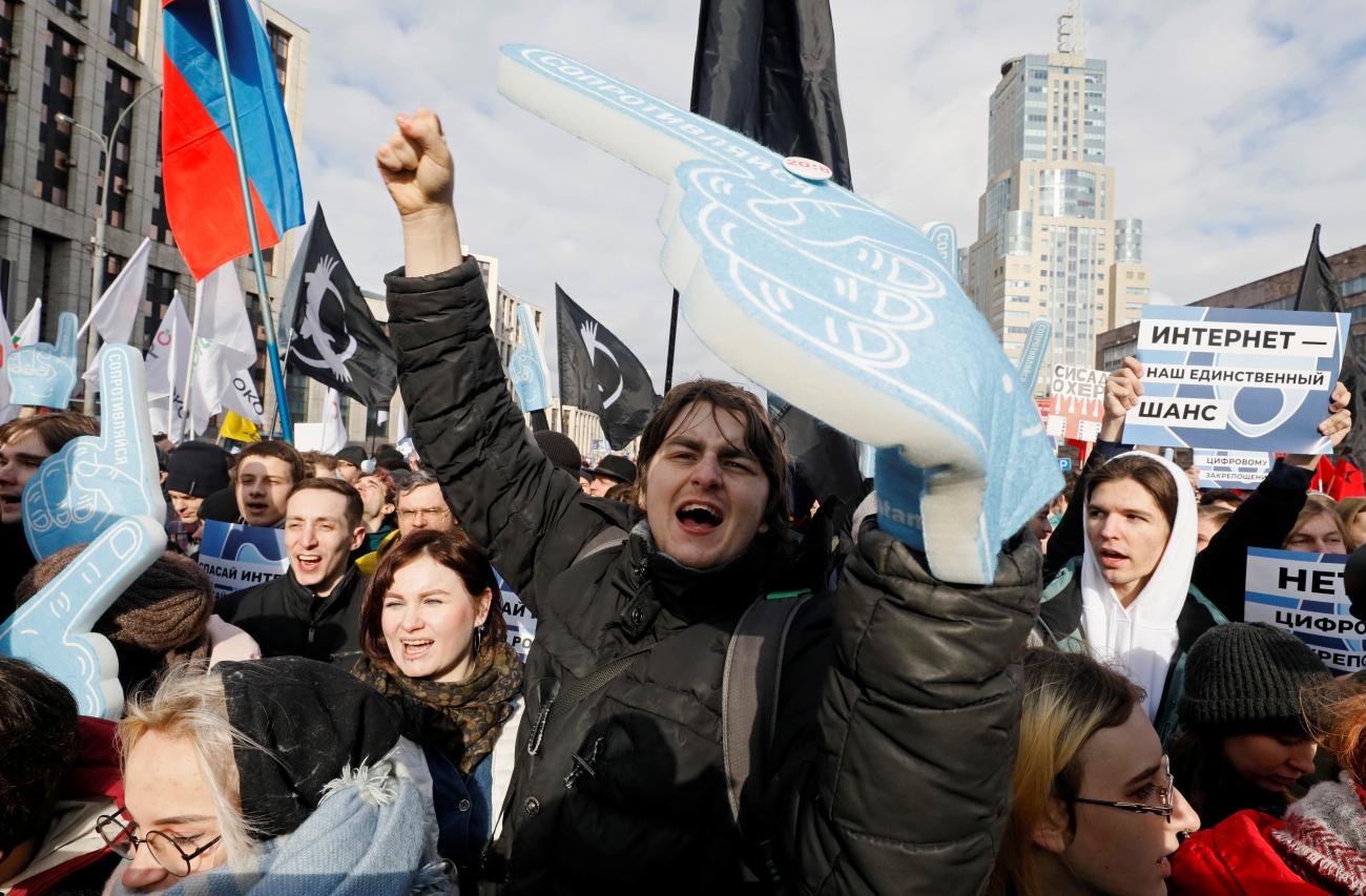 People shout slogans during a rally to protest against tightening state control over internet in Moscow, Russia, on March 10, 2019.