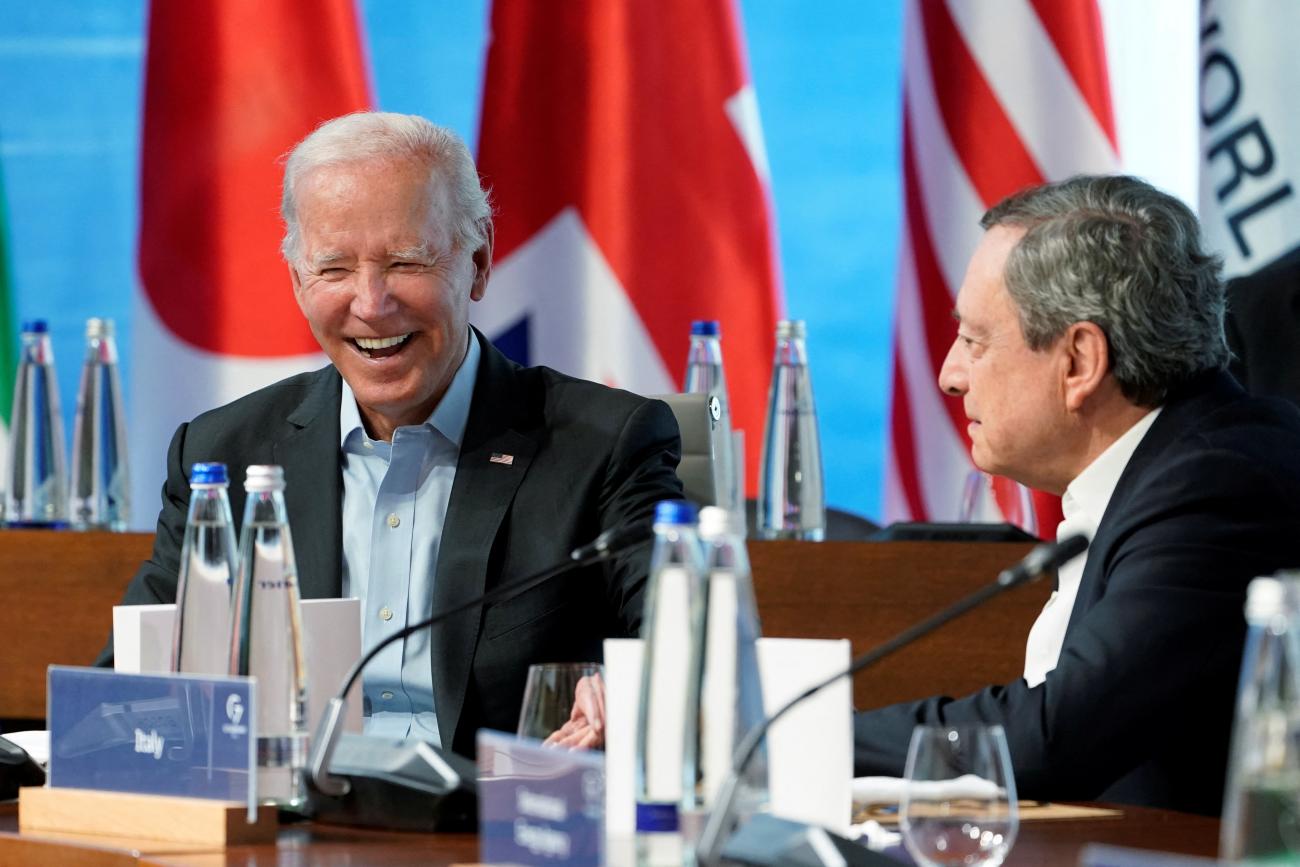 U.S. President Joe Biden, talks with Italy's Prime Minister Mario Draghi, before the start of a lunch with the Group of Seven leaders during the annual G7 summit at the Schloss Elmau hotel in Elmau, Germany, June 27, 2022.