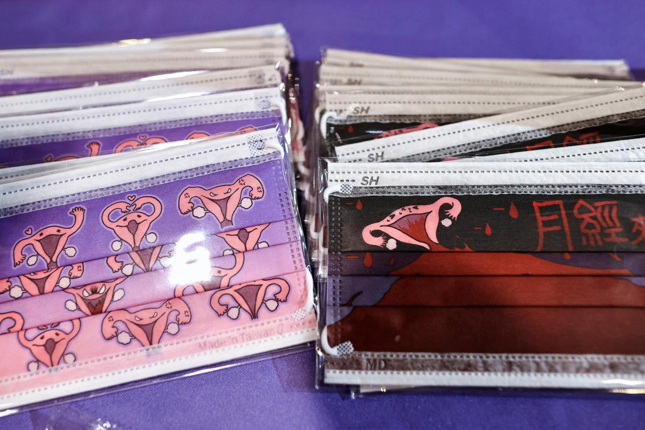 Red and pink face masks printed with impressions of a uterus at the GoMoond Period Party, the first menstruation-themed event in Taipei, Taiwan, May 28, 2022. 