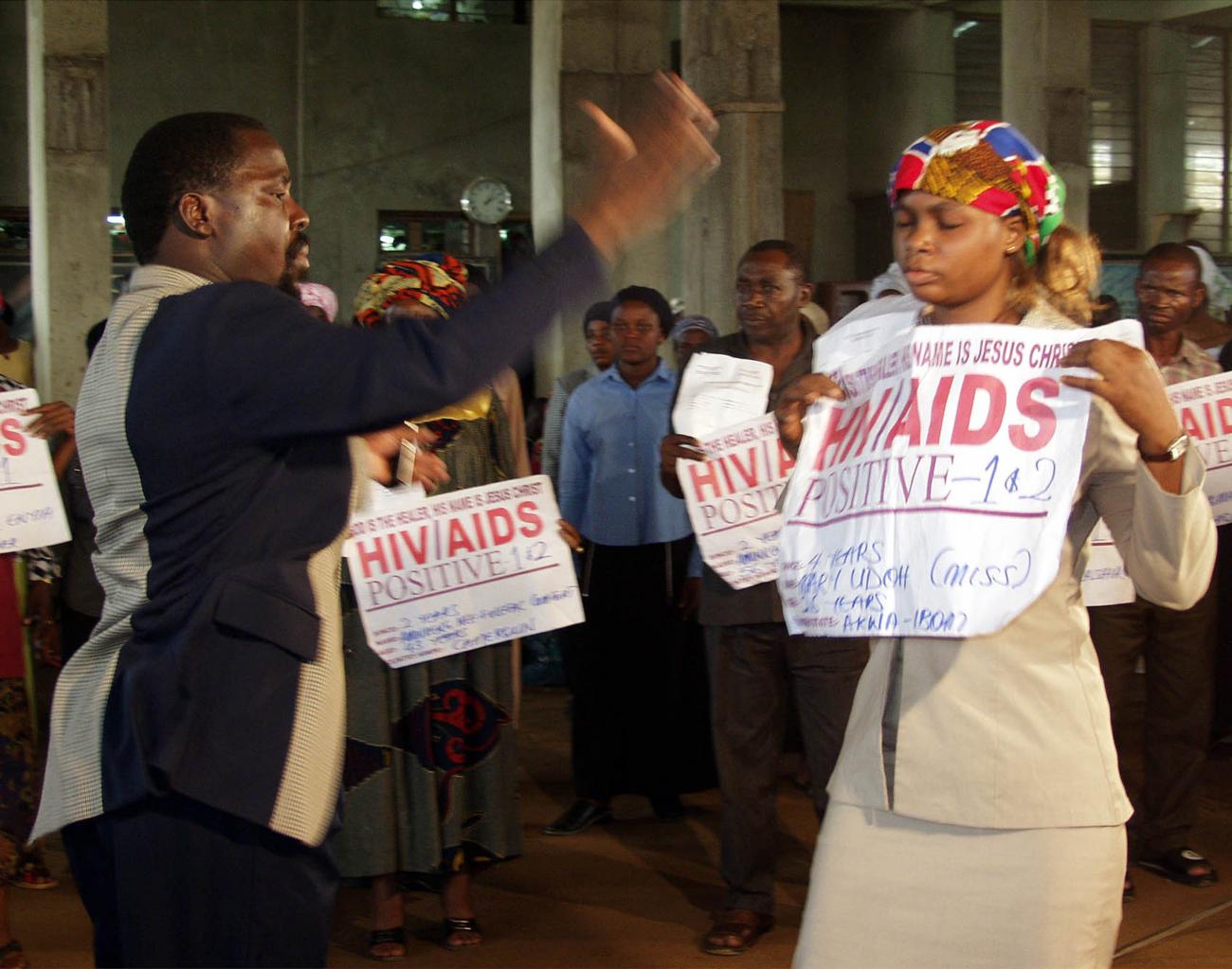 HIV/AIDS patient Miss Mary Udoh receives "miraculous healing" from Prophet T.B. Joshua of the synagogue Church For All Nations during a service at Ikotun-Egbe district in Lagos