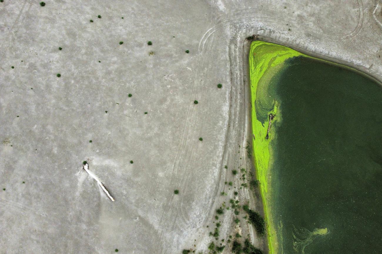 An arial view shows parts of the dried-up River Po that has been suffering from the worst drought in 70 years, near Borgo Virgilio, Italy, on August 7, 2022.