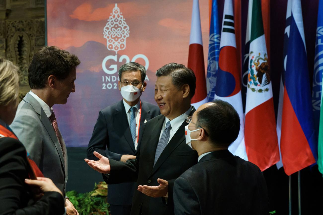 Canada's Prime Minister Justin Trudeau speaks with China's President Xi Jinping at the G20 Leaders' Summit in Bali, Indonesia, on November 16, 2022.