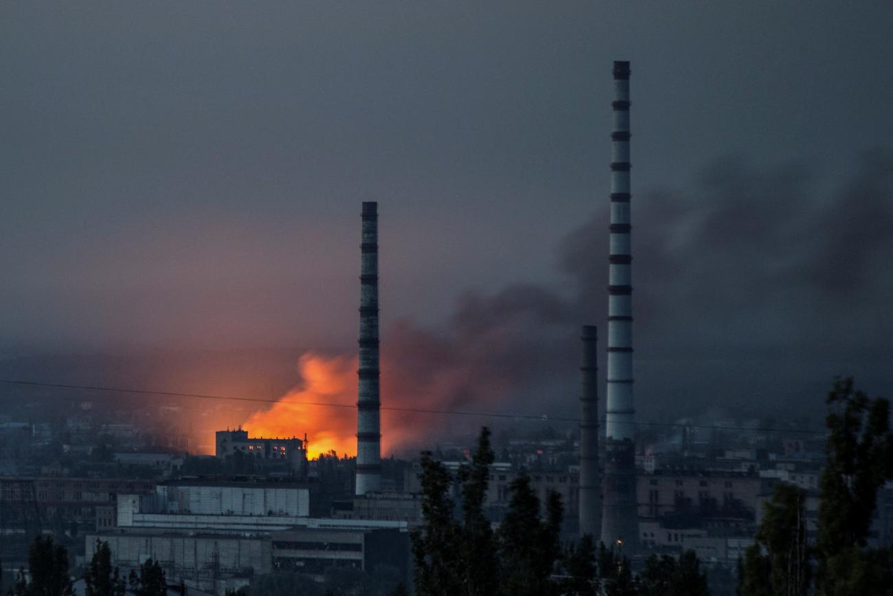 Smoke and flames rise after a military strike on a compound of Sievierodonetsk's Azot Chemical Plant, as Russia attacked Ukraine, in Lysychansk, Luhansk region, Ukraine, on June 18, 2022. 