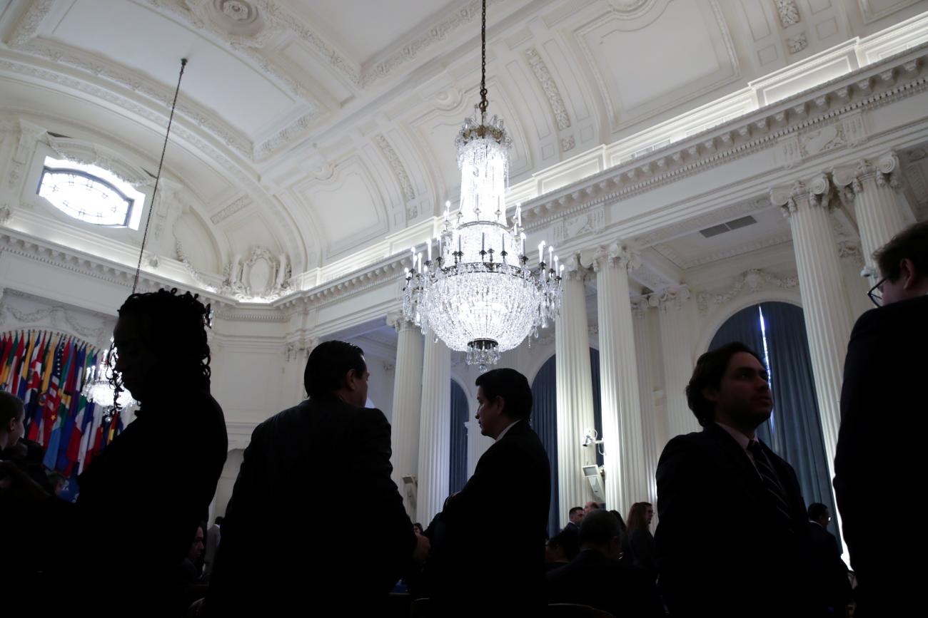 In January 2020, diplomats gathered in a room with chandeliers overhead to hear remarks by then-U.S. Secretary of State Mike Pompeo at the Organization of American States in Washington, DC.