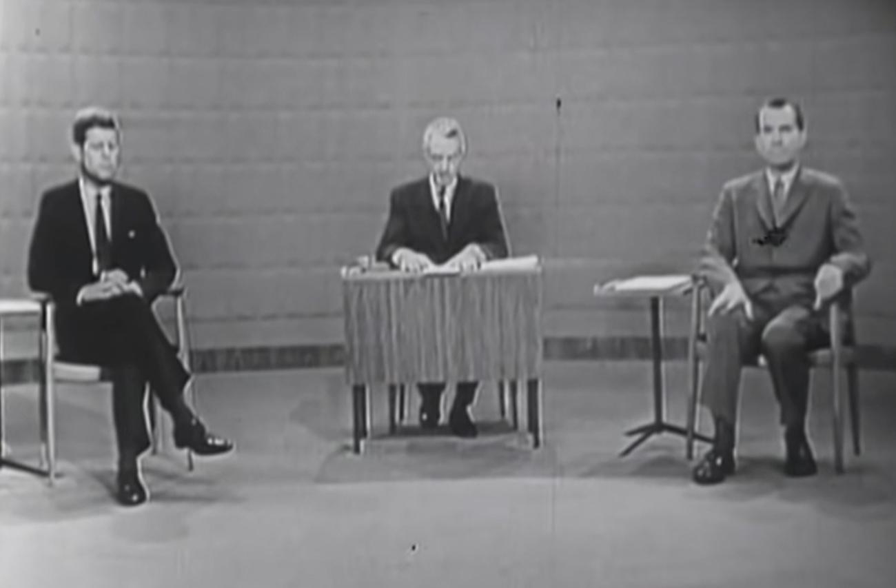 Senator John F. Kennedy and Vice President Richard Nixon sit prior to the start of the 1960 U.S. presidential election debate, in Chicago, Illinois, U.S., September 26, 1960. 