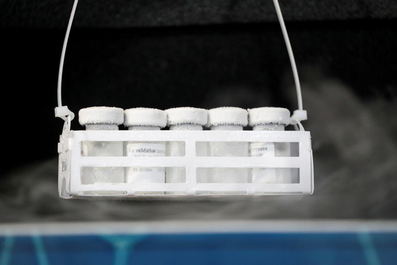 Demonstration vials are removed from the Renergen's working prototype cold-chain storage called Cryo-Vacc, that can keep COVID-19 vaccines ultra-cold during transportation, at a media launch in Johannesburg, South Africa, on February 15, 2021.