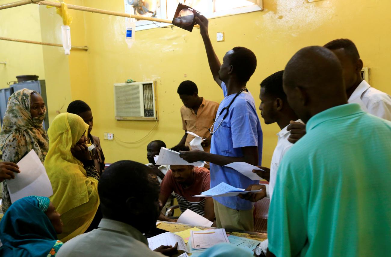 A doctor looks at an X-ray of a victim of violence in the crackdown on Sudanese protesters inside a ward in a hospital in Omdurman, Khartoum, Sudan, on June 10, 2019. REUTERS/Mohamed Nureldin Abdallah