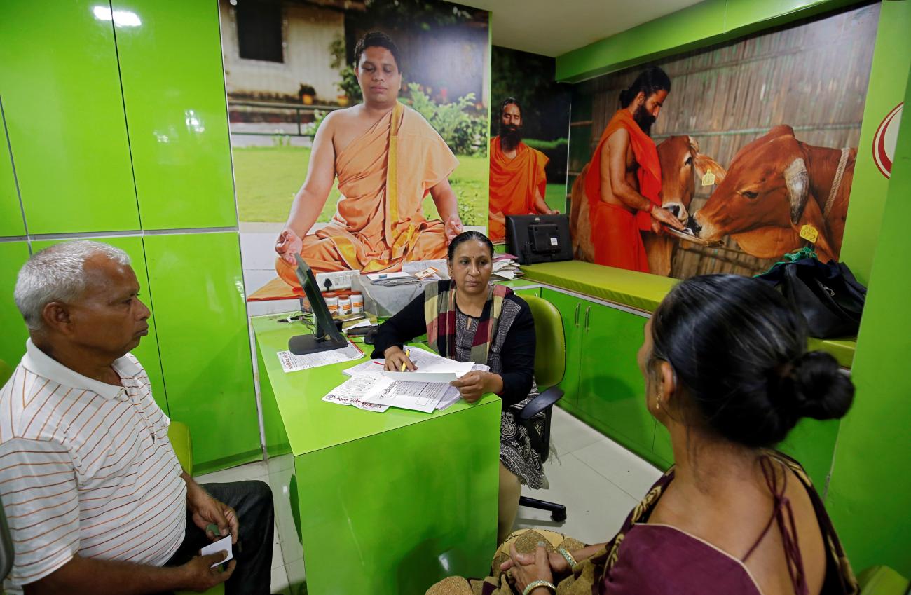An Ayurveda doctor collects her patient's history before examining her at a Patanjali Ayurved clinic in Ahmedabad, India, March 28, 2019.