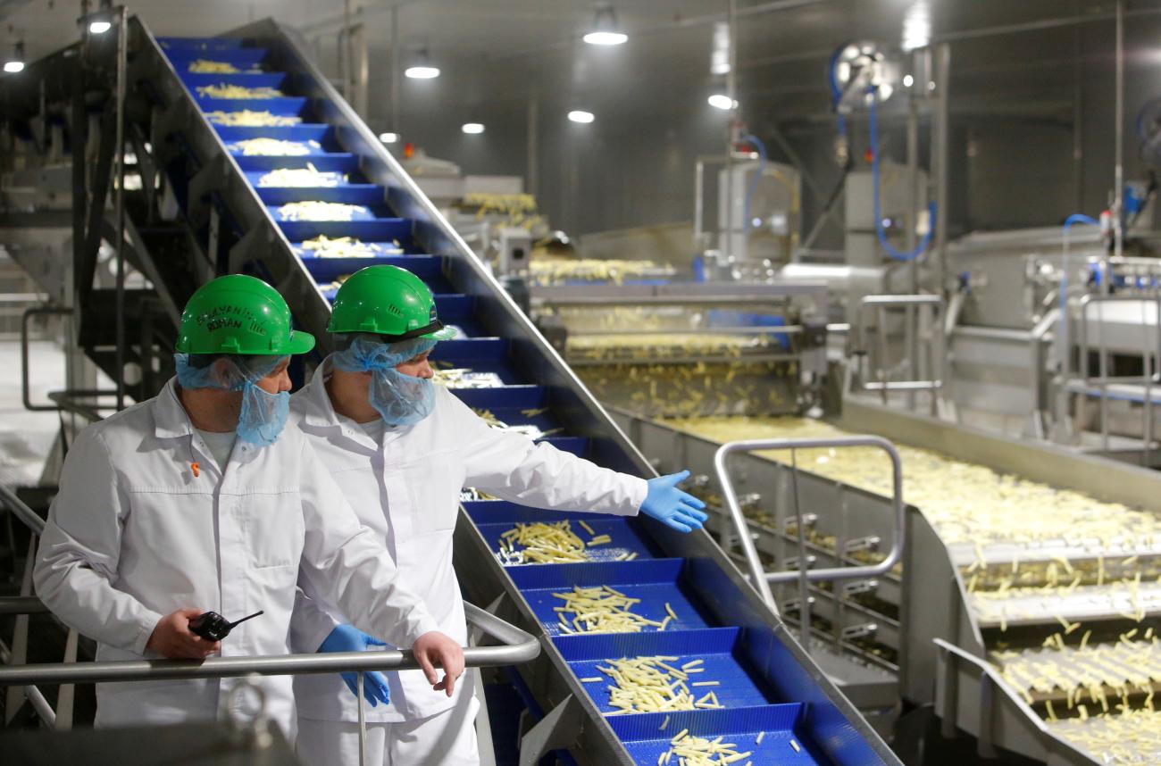 Employees work at a potato processing plant near Lipetsk, Russia, April 25, 2018.