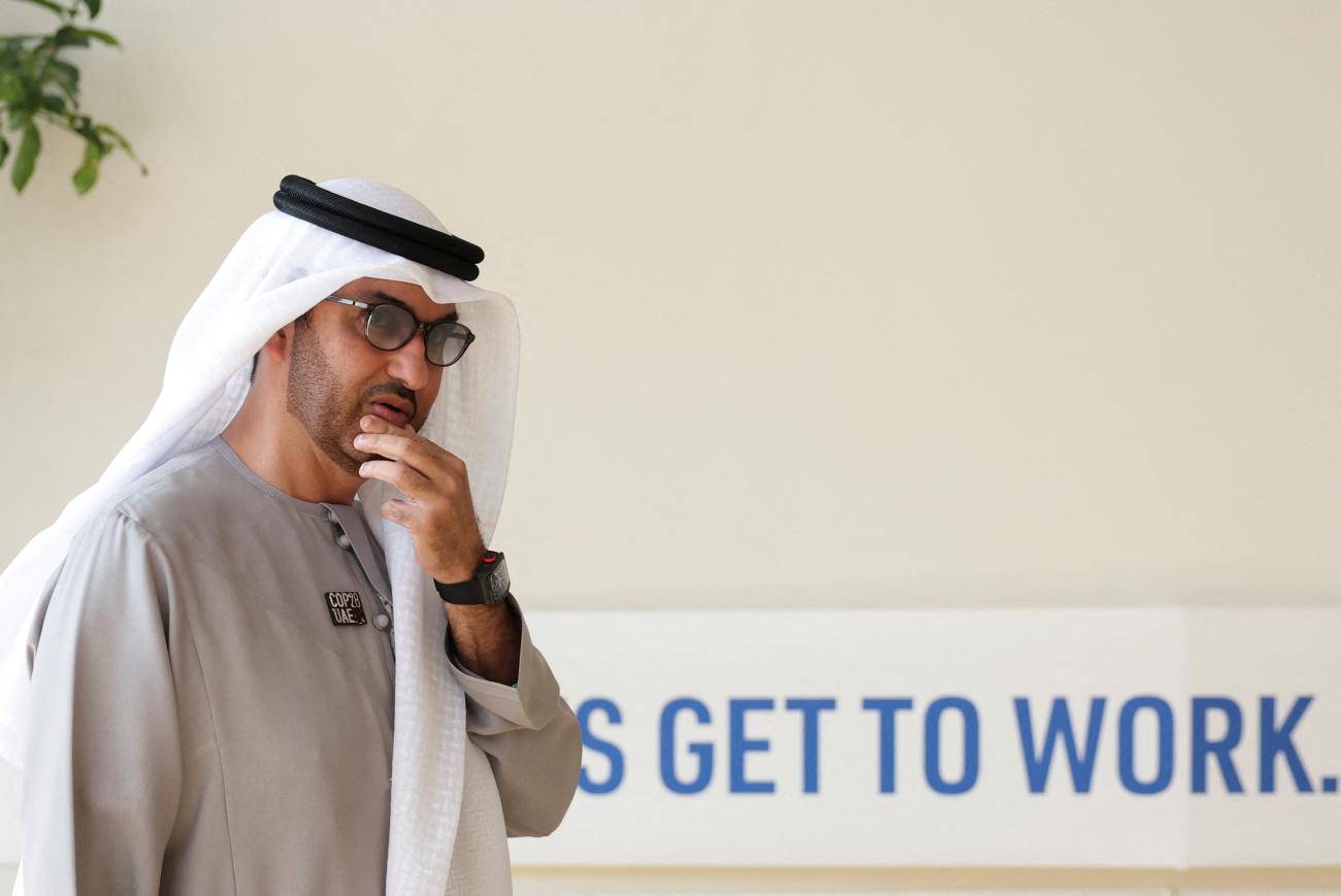 United Arab Emirates Minister of Industry and Advanced Technology and COP28 President Sultan Ahmed Al Jaber walks, after a draft of a negotiation deal was released, at the United Nations Climate Change Conference COP28 in Dubai, United Arab Emirates, December 13, 2023