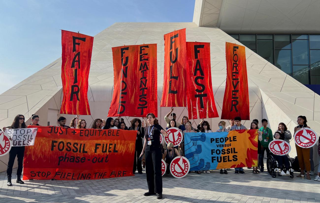 Climate activists protest after a draft of a negotiation deal was released, at the United Nations Climate Change Conference COP28 in Dubai, United Arab Emirates, December 13, 2023. 