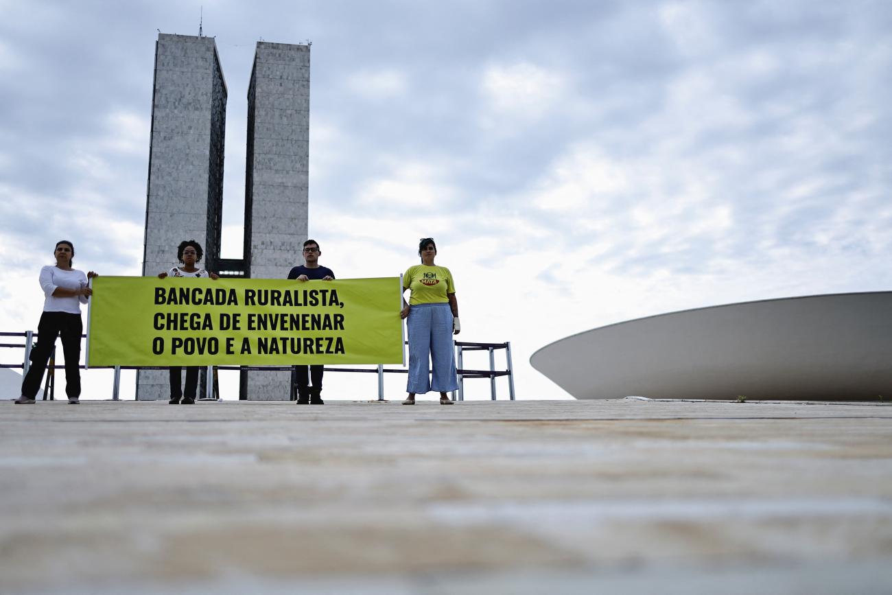 DOCUMENT DATE:  October 04, 2023  Greenpeace activists hold a sign reading in Portuguese : "Ruralist Bench, no more poisoning the people and nature."