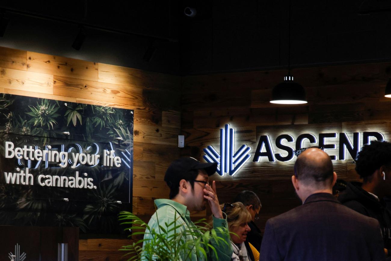 People line up to buy recreational marijuana at the Ascend marijuana dispensary.