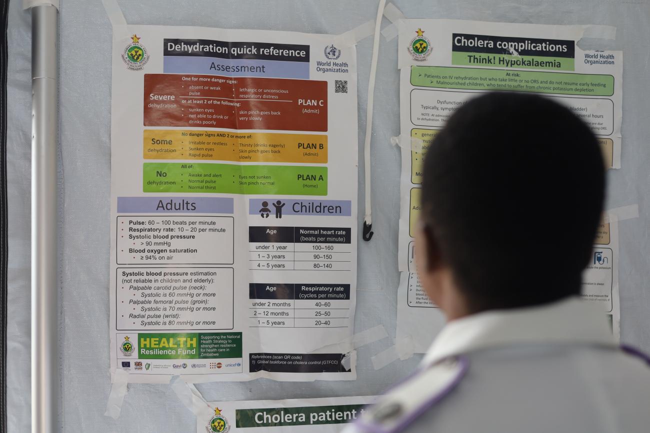 A nurse looking at a protocol management chat in one of the wards at Zvipiripiri clinic in Marange.