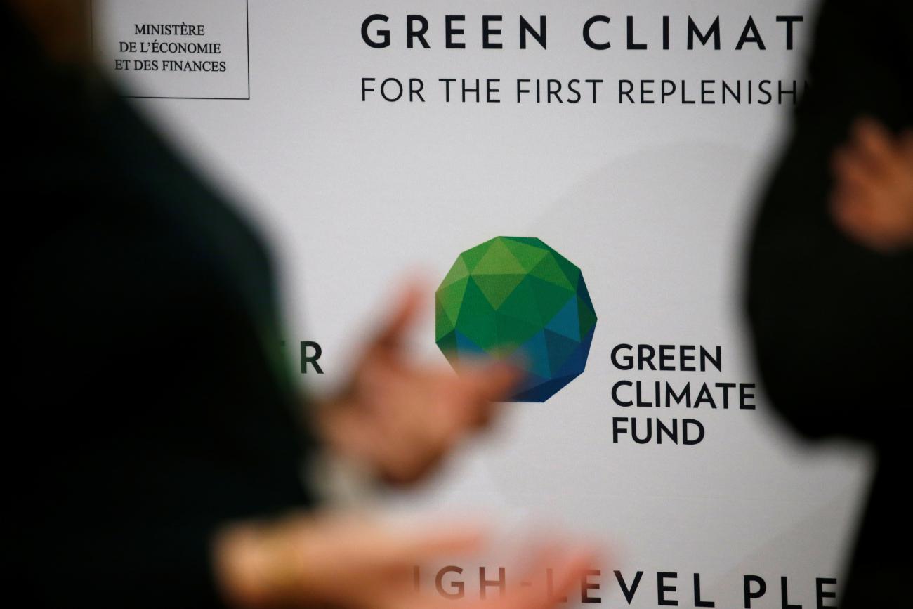 People arrive to attend the Pledging Conference of the Green Climate Fund (GCF) for the First Replenishment.