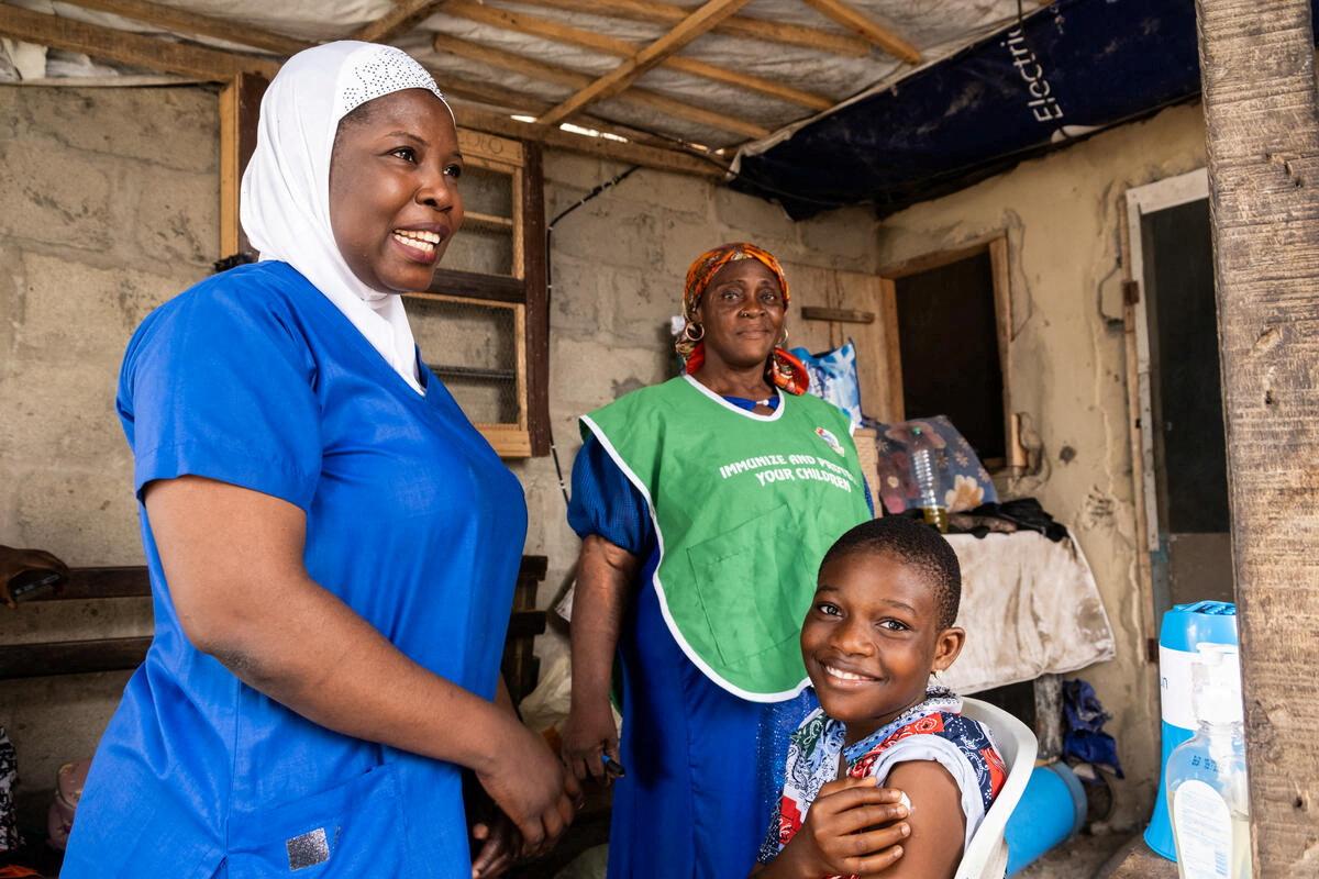 A girl reacts after receiving the HPV vaccine during the first phase of a country-wide HPV Vaccination Campaign targeting school-age girls between 9 and 14 years old, in Lagos State, Nigeria, November 3, 2023