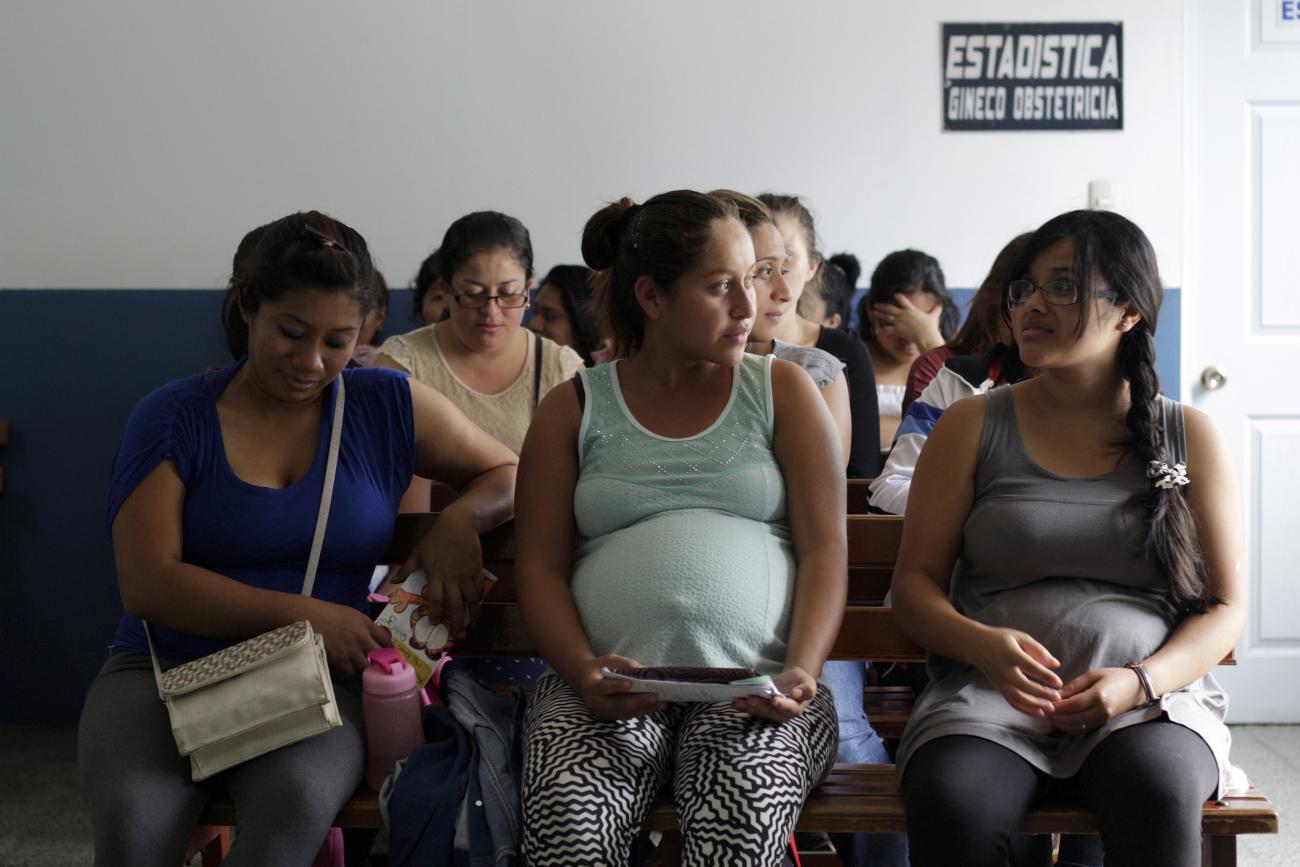 Pregnant women wait for a general routine checkup.