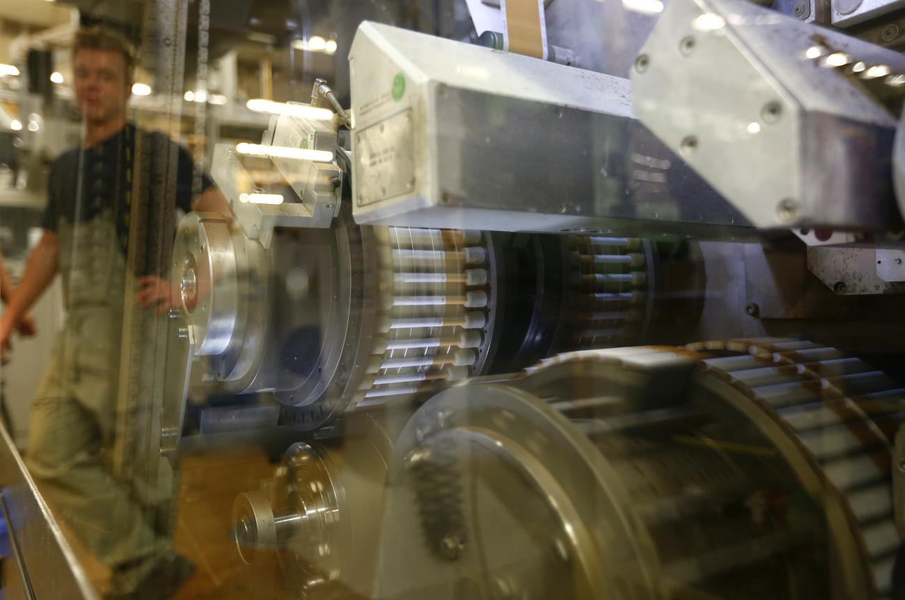 Cigarettes are seen during the manufacturing process in the British American Tobacco Cigarette Factory.
