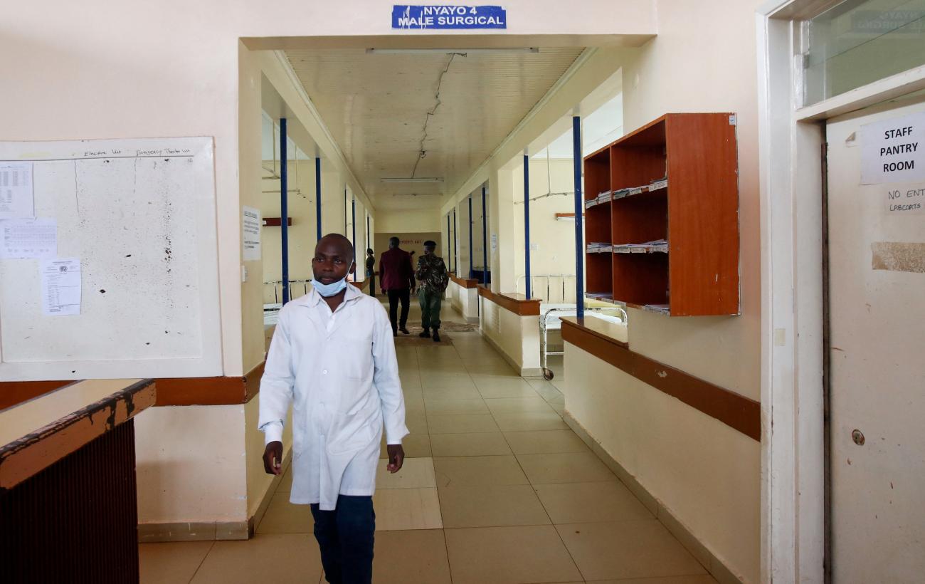 A medical worker walks in the Kiambu Referral Hospital.