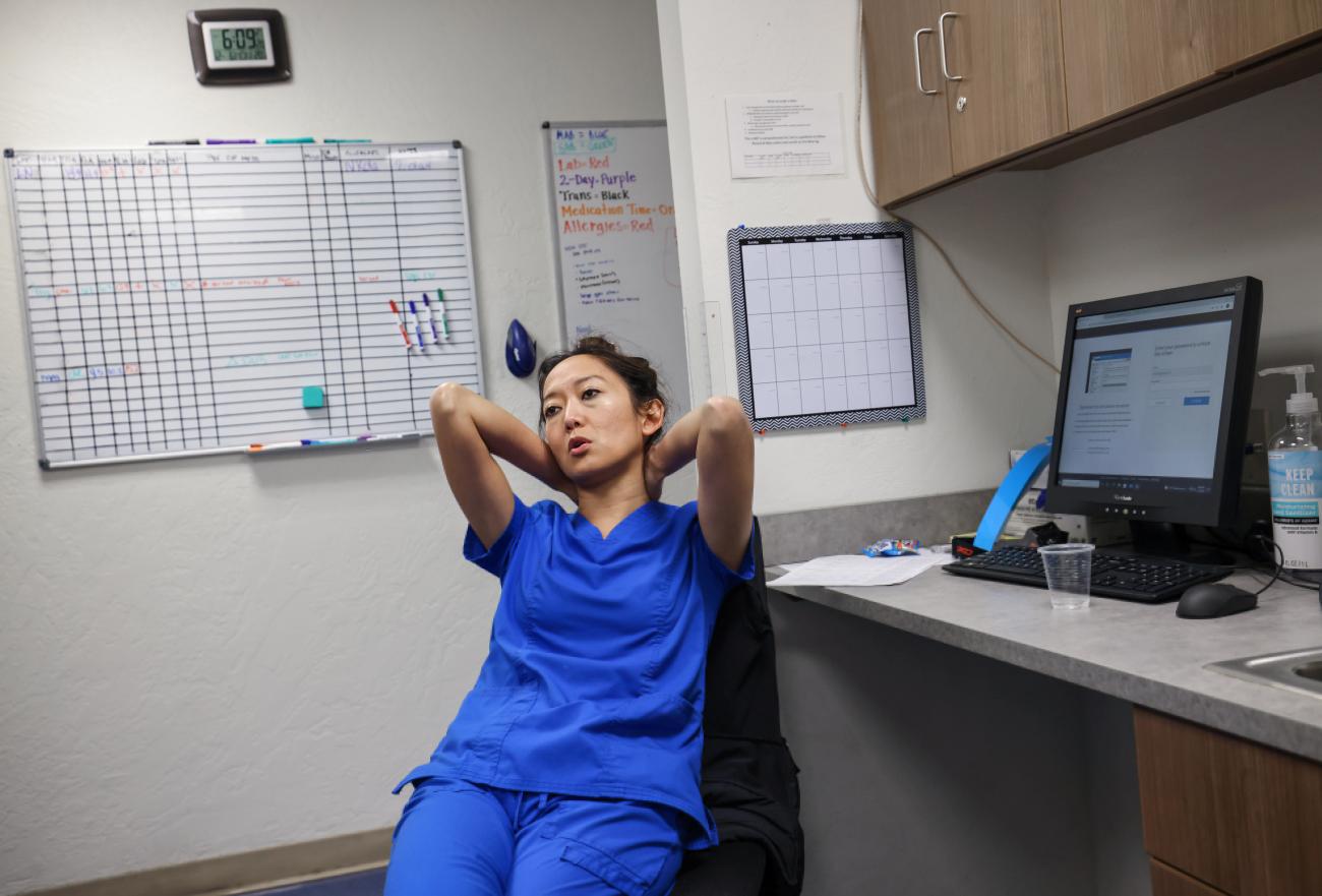 Shelly Tien, MD, sits at her desk after finishing the last abortion of the day at the Trust Women clinic.