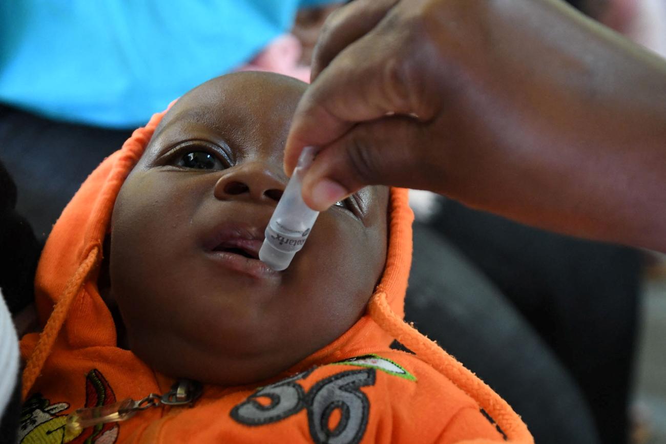 A baby receives a rotavirus vaccination at Fort Portal Regional Referral Hospital in Uganda, November 2021.