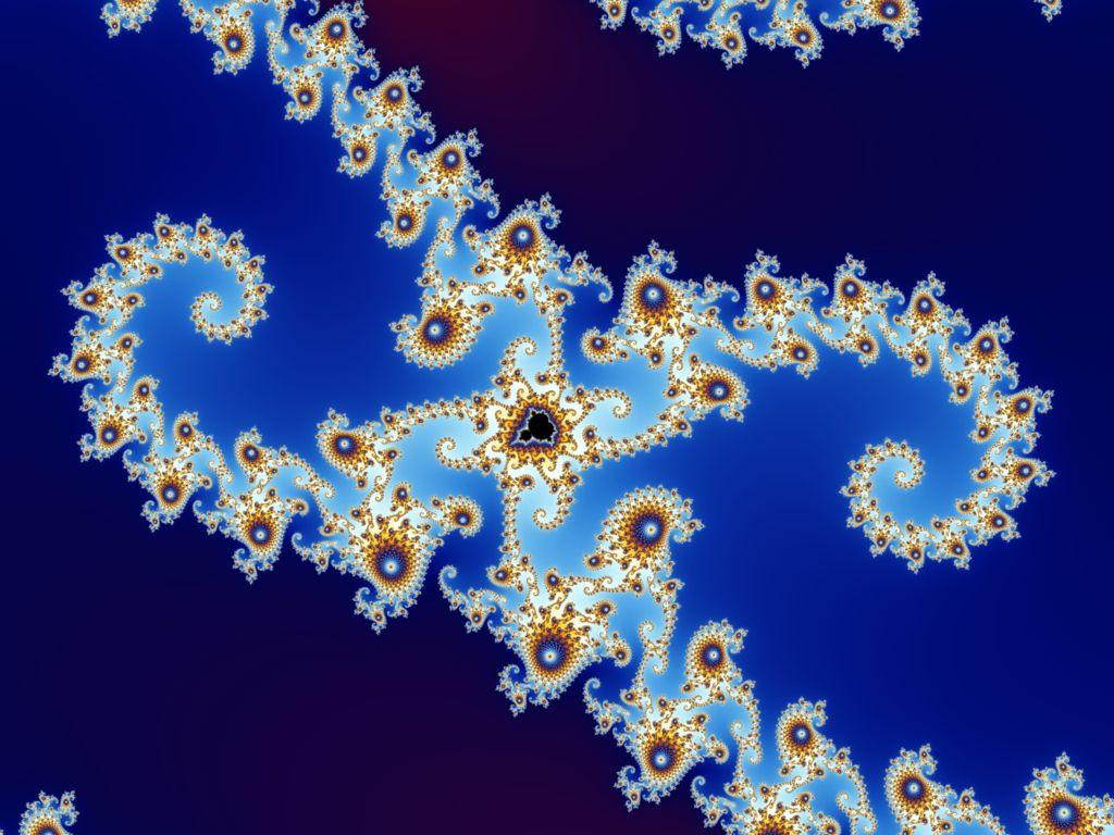 Partial view of the Mandelbrot set. Step 6 of a zoom sequence: Satellite. The two "seahorse tails" are the beginning of a series of concentrical crowns with the satellite in the center.