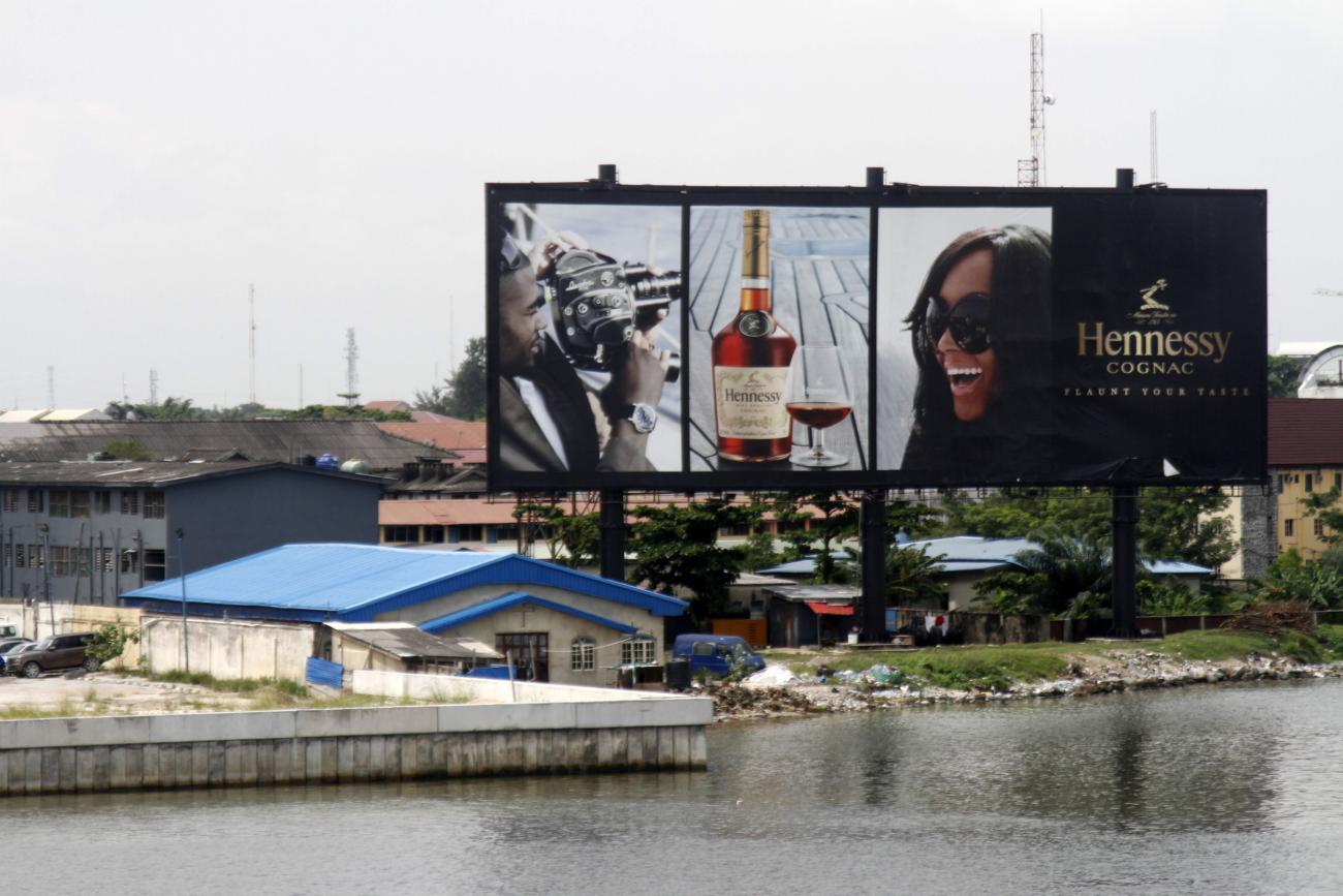A billboard advertising Hennessy cognac is pictured near the lagoon, in Ikoyi district, in Lagos, Nigeria, on June 6, 2013. 