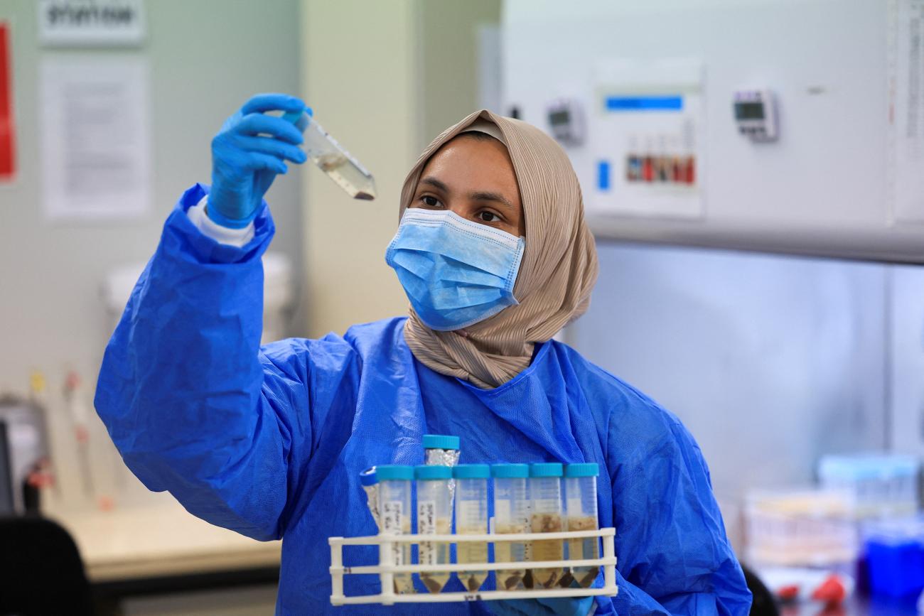 Scientific officer Maryam Karaan works in the research lab at the University of Cape Town's Institute of Infectious Disease and Molecular Medicine, in Cape Town, South Africa, on February 17, 2025. 