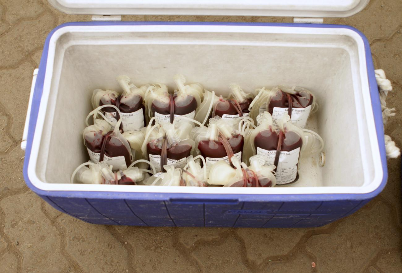 Plastic bags filled with donated blood are stored in a cooler at a donation center, in Nairobi, Kenya, on January 9, 2012. 