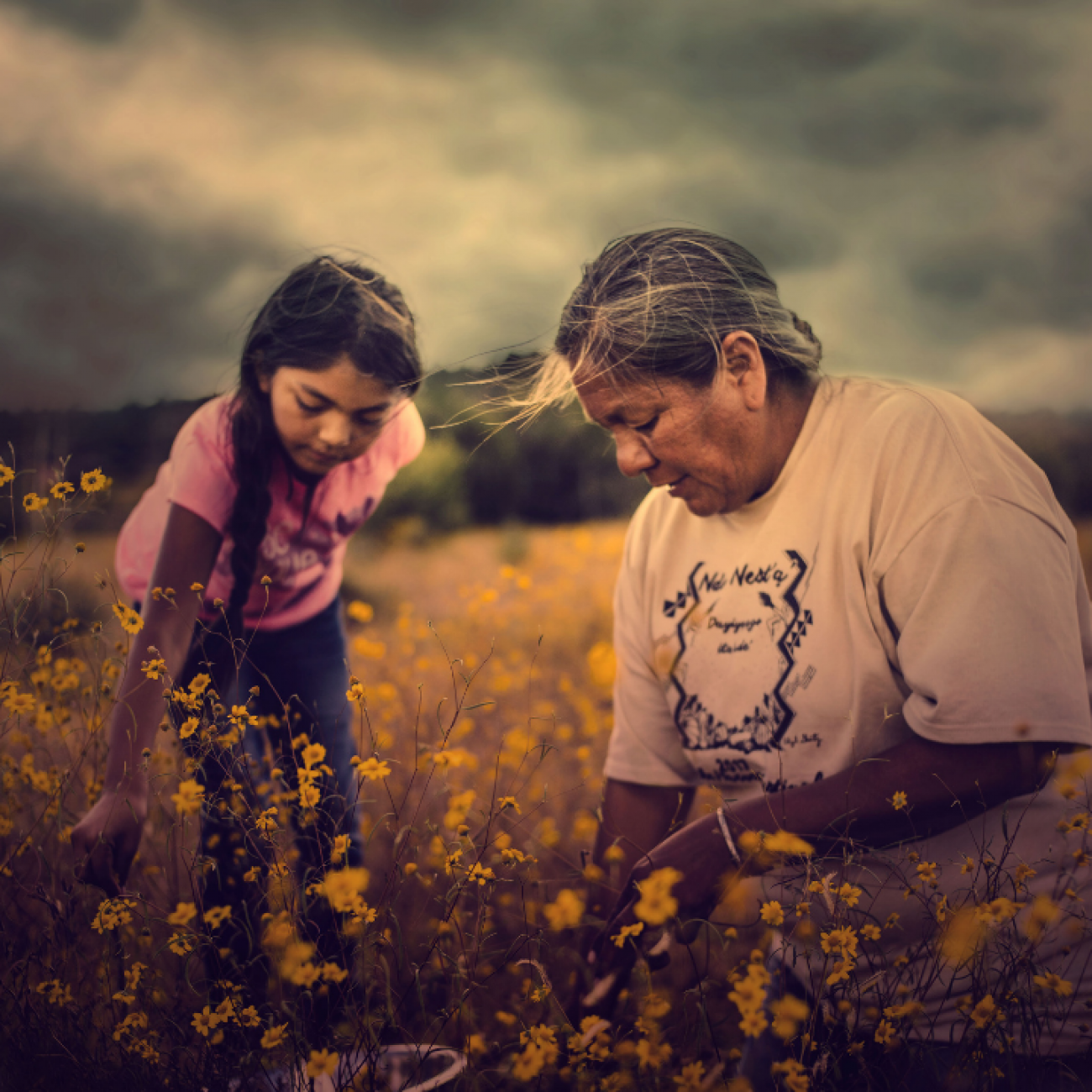 Twila Cassadore teaching her niece to forage for food on the San Carlos Apache Nation, Arizona.