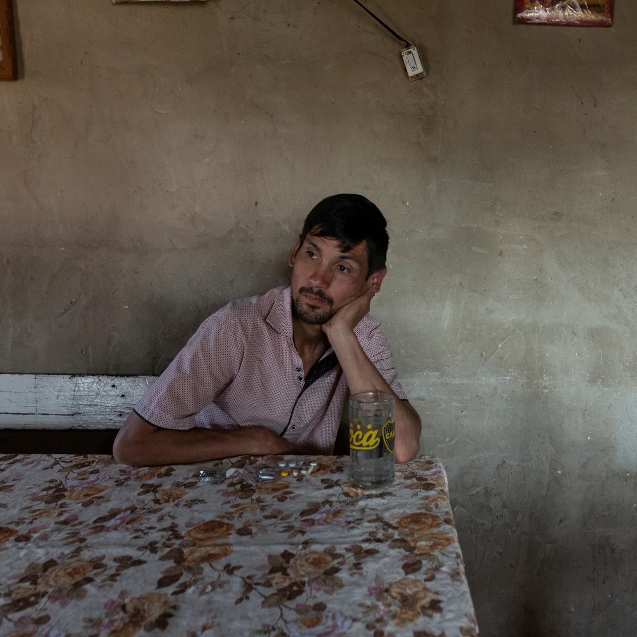 Cristian Molina, 26, takes his tuberculosis medication at his house in the shantytown of Lujan in Buenos Aires, Argentina, September 26, 2019. Molina is prescribed to take 11 tablets per day, seven in the morning and four in the afternoon, which often give him a stomachache. 