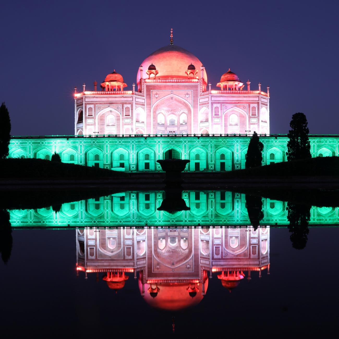 Humayun's Tomb was lit up pink and green to celebrate India’s milestone of administering one billion COVID-19 vaccine doses, in New Delhi, India, on October 21, 2021. 