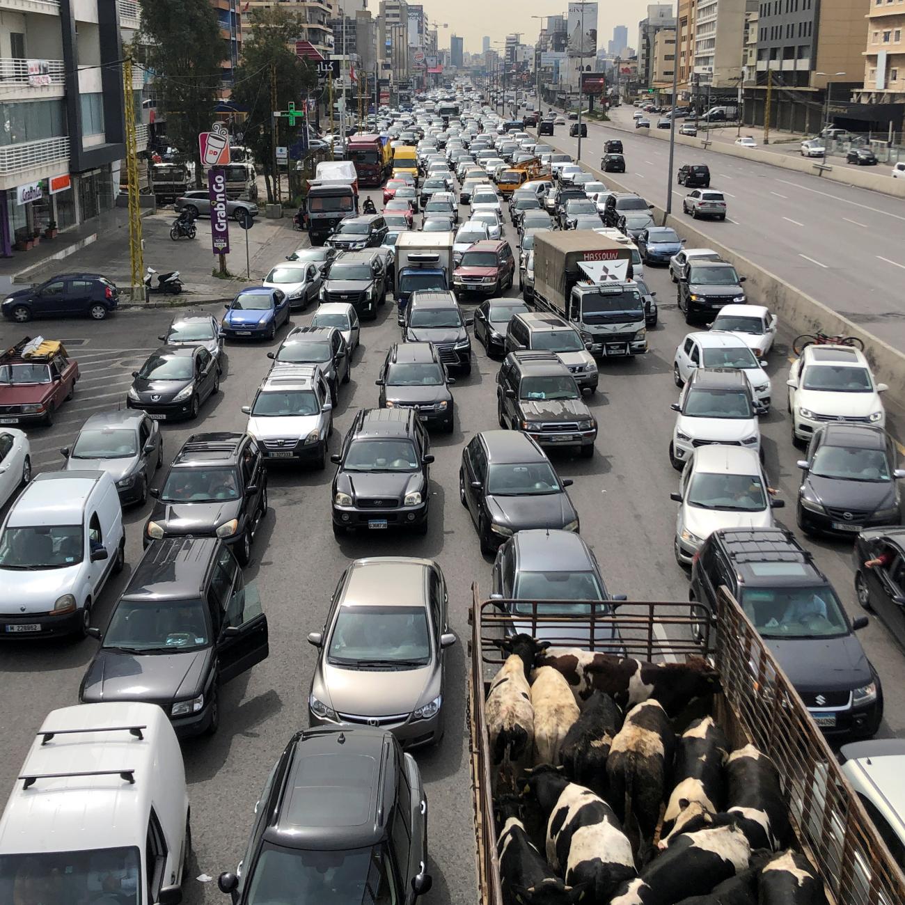 Vehicles are stuck in a traffic jam on a highway, in Jal el-Dib, Lebanon, on March 9, 2021.