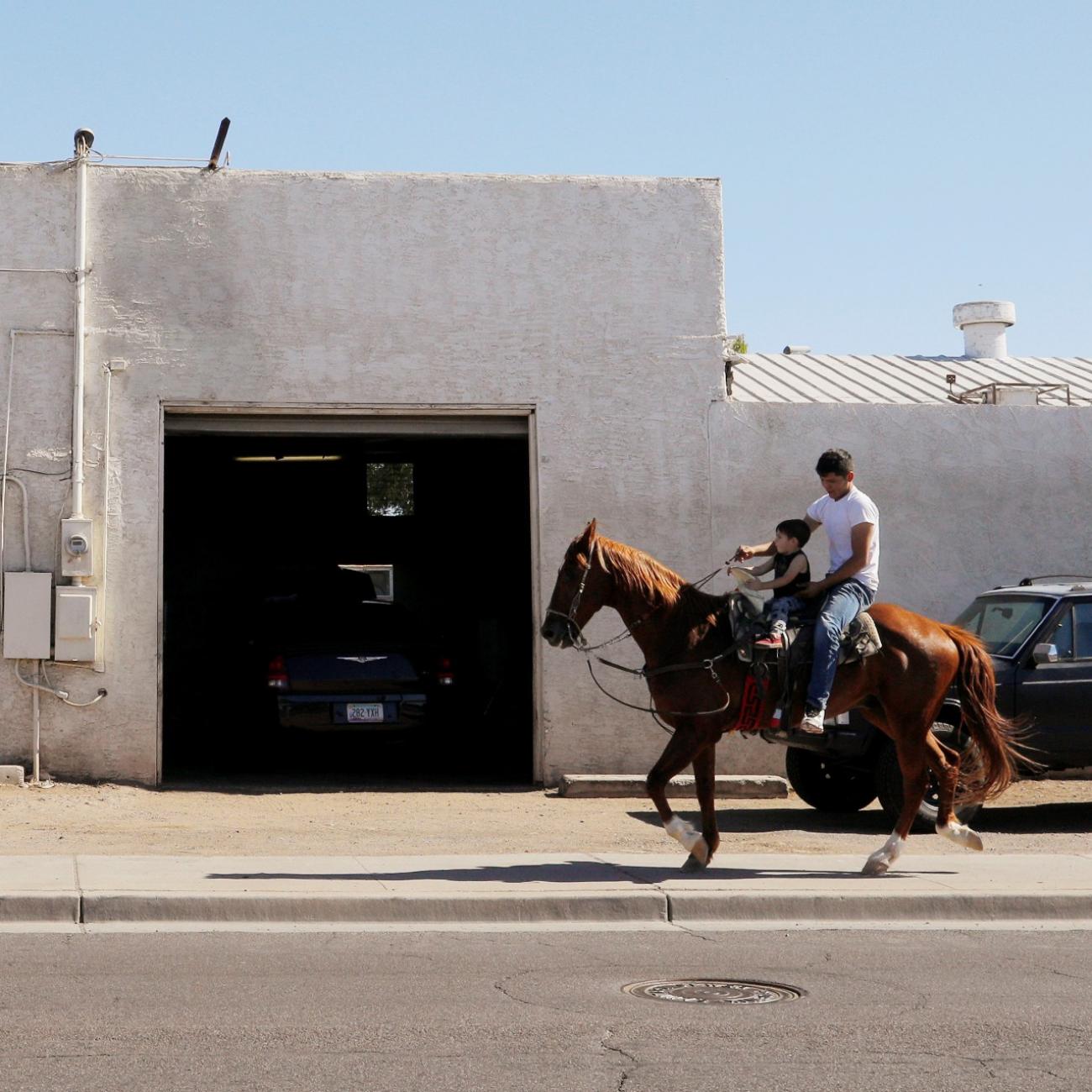 a man rides a horse in phoenix