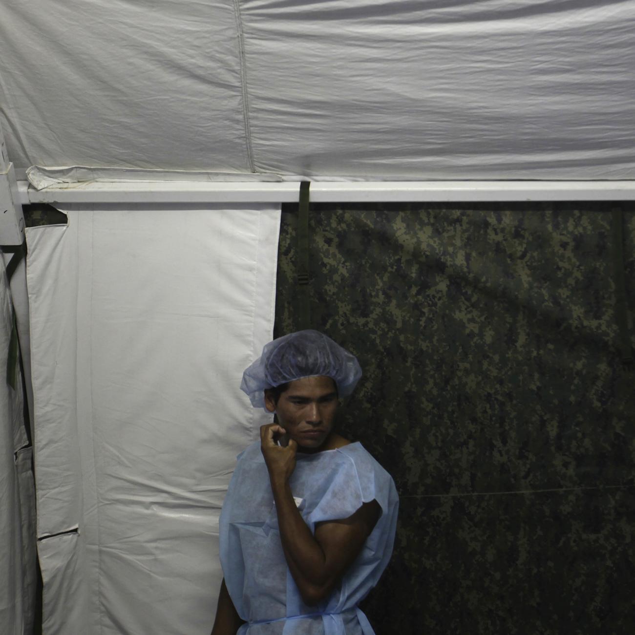 A man from the Yanomamy tribe waits for his surgery at the surgical center at the Cartucho community during a medical expedition in Santa Izabel do Rio Negro, in Amazonas state in northern Brazil, November 8, 2010. 