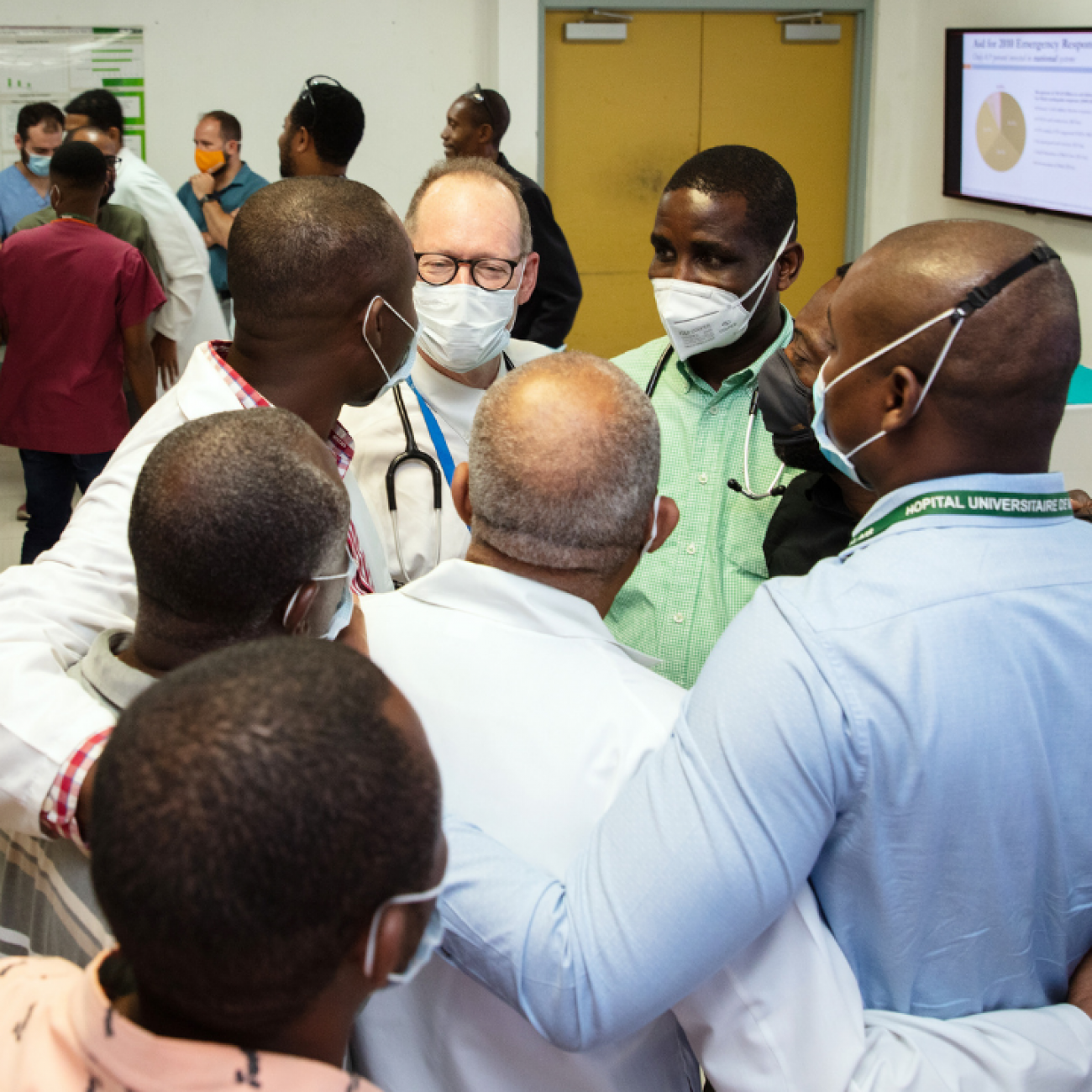 While helping with the response to the Aug. 14, 2021, earthquake, Dr. Paul Farmer gives a lecture on the 2010 Haiti earthquake and speaks with clinicians at Hospital University de Mirebalais.