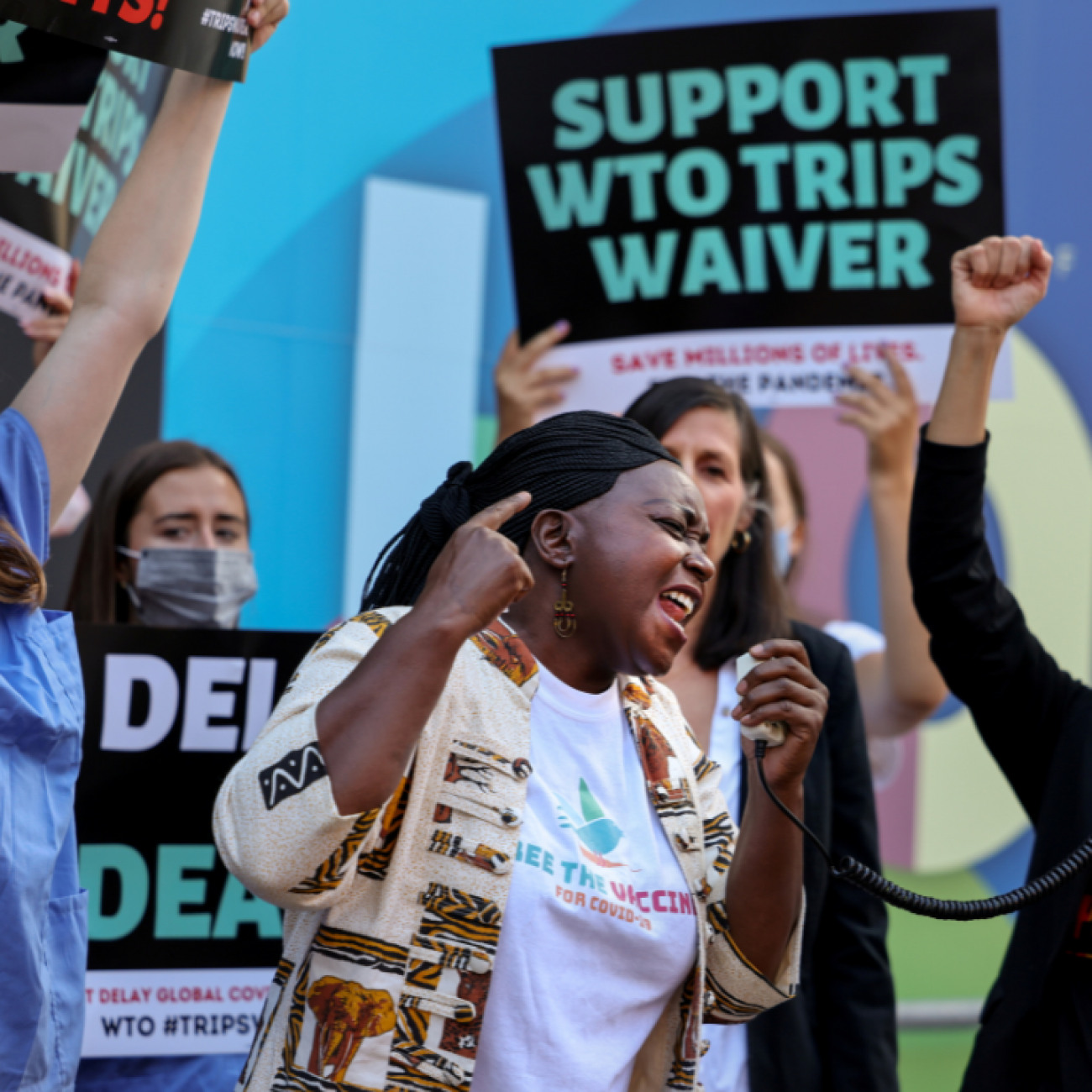 Pauline Muchina, of American Friends Service Committee, and activists call on the EU to end opposition to a COVID-19 waiver of WTO intellectual property barriers, in Washington, DC, June 24, 2021. 
