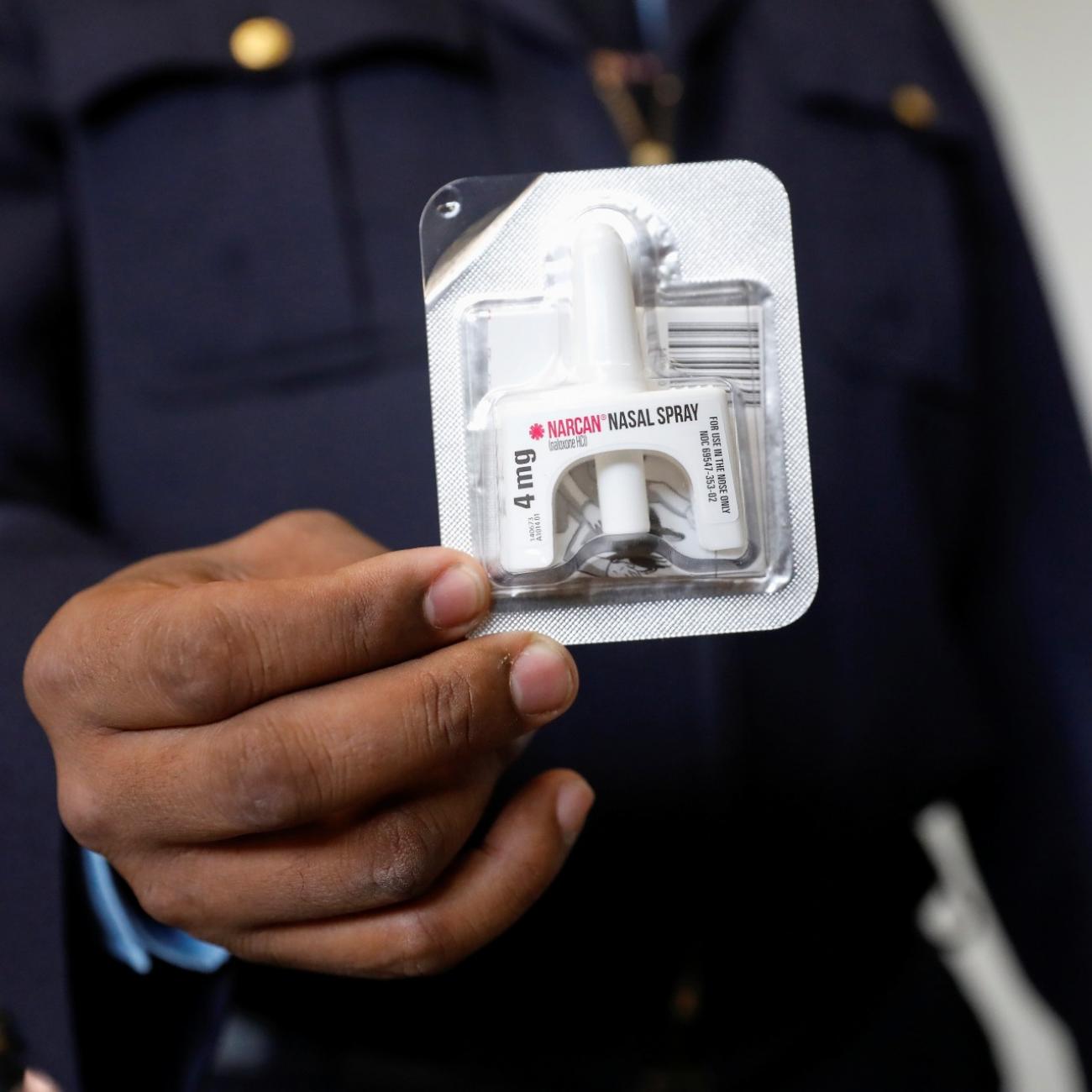 Corrections officer Anthony Willingham displays Naloxone nasal spray, part of an opioid anti-overdose medicine kit for inmates to take with them upon release, before a training session for inmates at the Queensboro Correctional Facility in Queens, New York, U.S., April 9, 2018. 