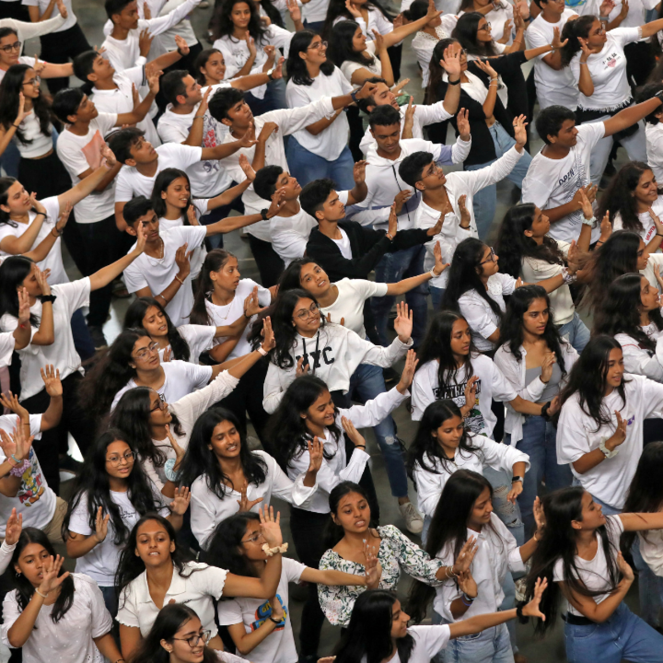 A bird's eye view of dozens of college students performing during a flash mob as a tribute to the cultural diversity of India, at Mumbai Central railway station, in Mumbai, India, September 22, 2022. REUTERS/Niharika Kulkarni