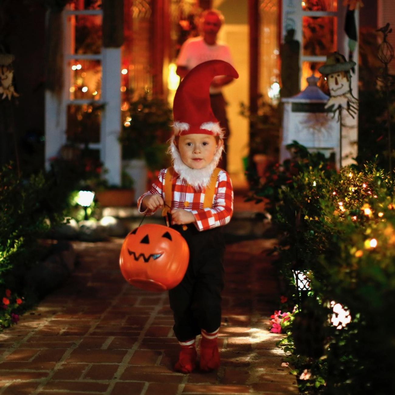 A boy collects candy as he goes trick-or-treating for Halloween in Santa Monica, California, October 31, 2012. (REUTERS/Lucy Nicholson)