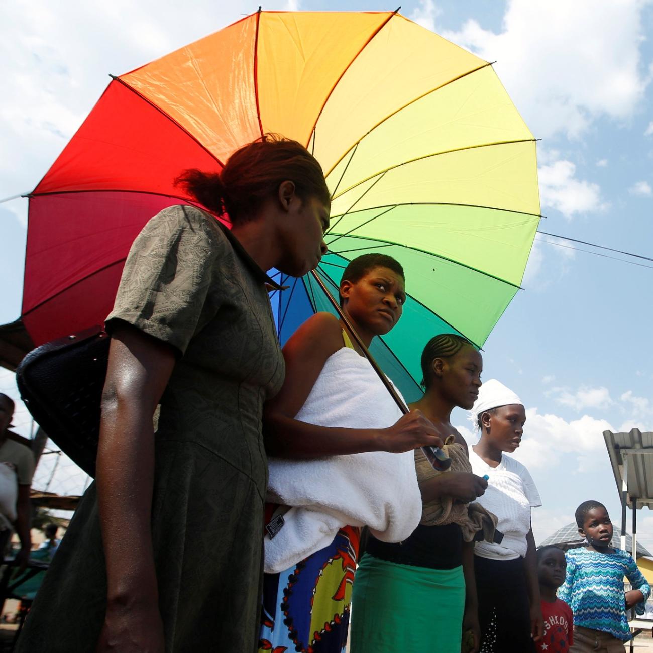 Residents queue to receive cholera vaccinations at a clinic in Harare, Zimbabwe, on October 4, 2018.