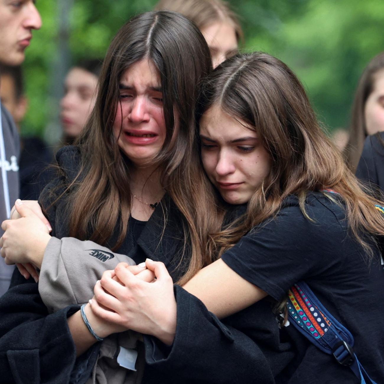 children mourn the death of heir classmate
