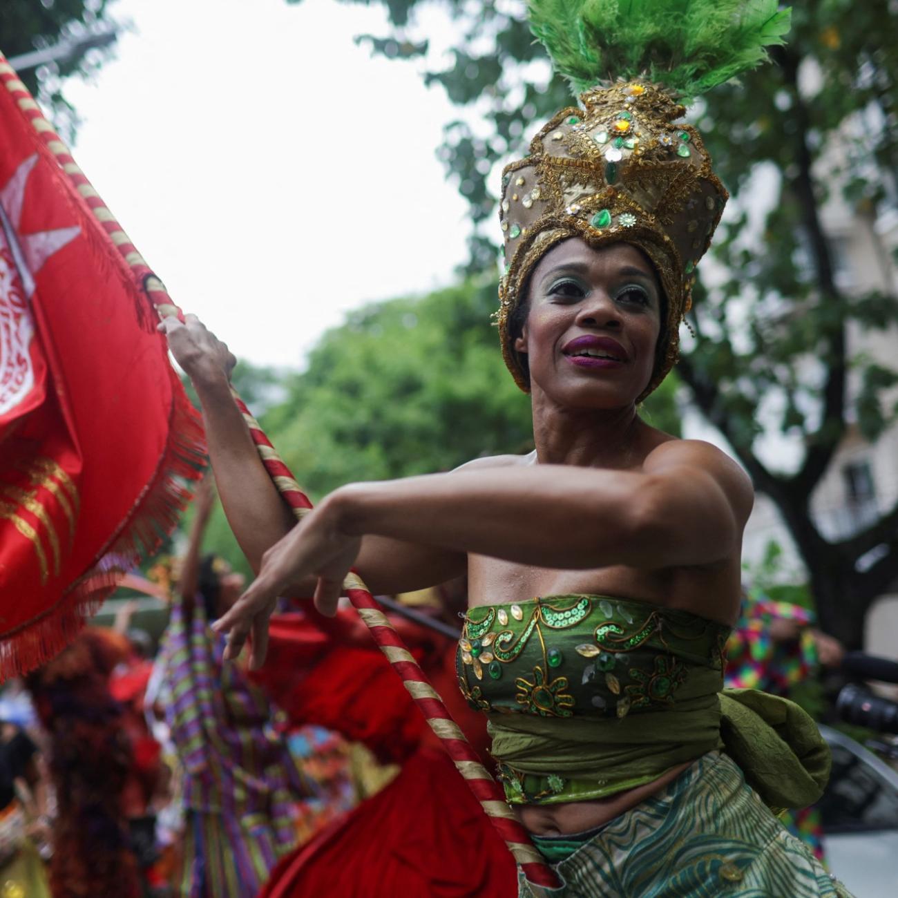 Revellers take part in the annual block party 'Loucura Suburbana' organized by the Nise da Silveira Mental Health Institute during pre-carnival festivities in Rio de Janeiro, Brazil, February 16, 2023.