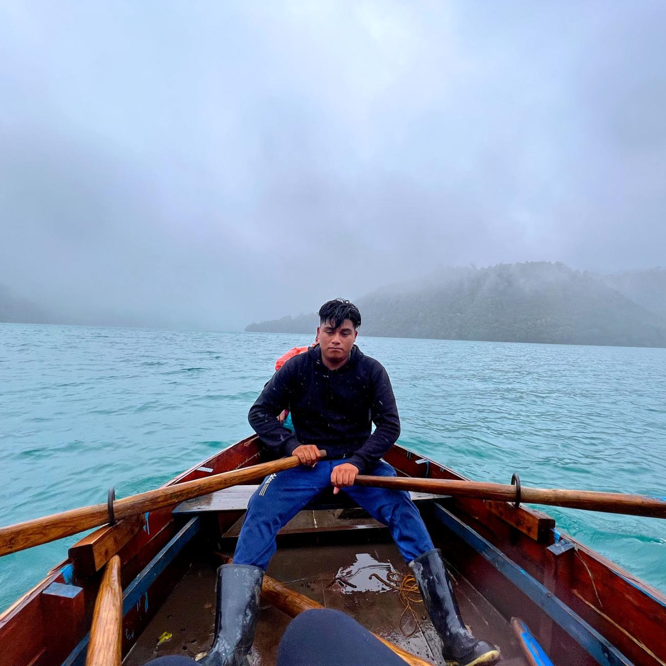 A local guide rows a motorless boat, in in Laguna Brava, Guatemala.