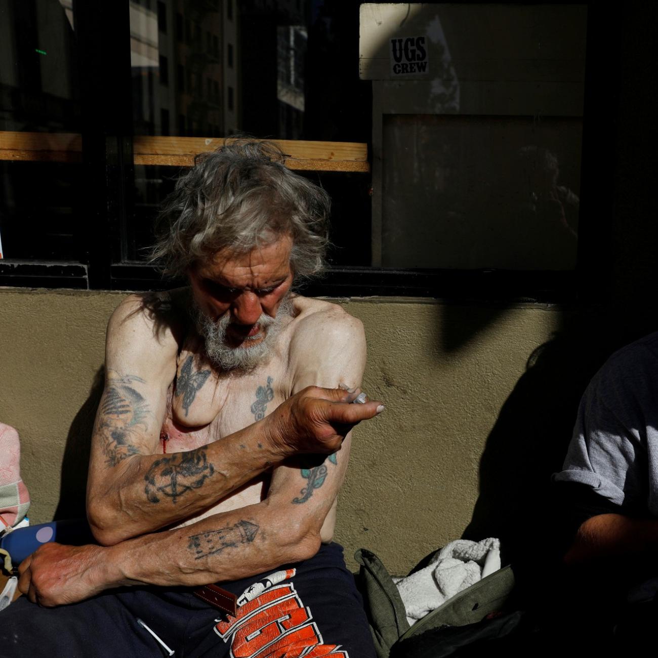 DOCUMENT DATE:  February 28, 2020  Travis Hayes, 65, injects what he says is the synthetic drug fentanyl, across the street from where San Francisco mayor London Breed just held a news conference introducing legislation in curbing the rise of deadly overdoses in the city, at the Tenderloin section of San Francisco, California, U.S., February 27, 2020. 