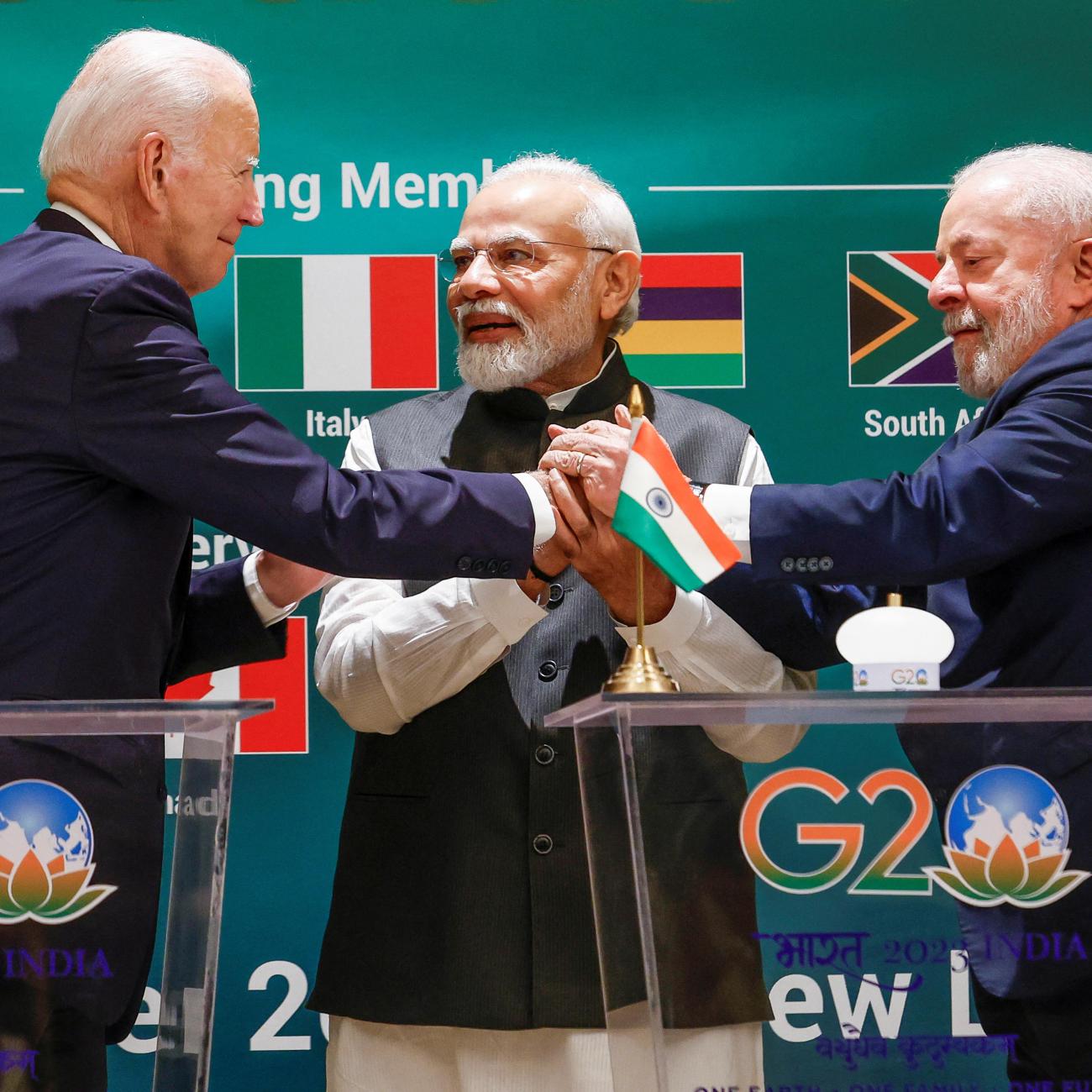 U.S. President Joe Biden, Indian Prime Minister Narendra Modi and Brazilian President Luiz Inacio Lula da Silva hold hands as they attend the launch of the Global Biofuels Alliance at the G20 summit in New Delhi, India, September 9, 2023. 