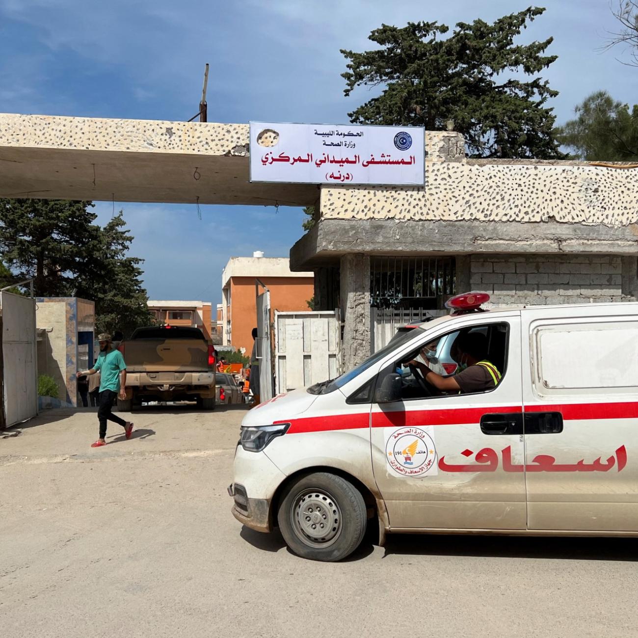 An ambulance arrives outside a hospital following deadly floods, in Derna, Libya, on September 17, 2023.